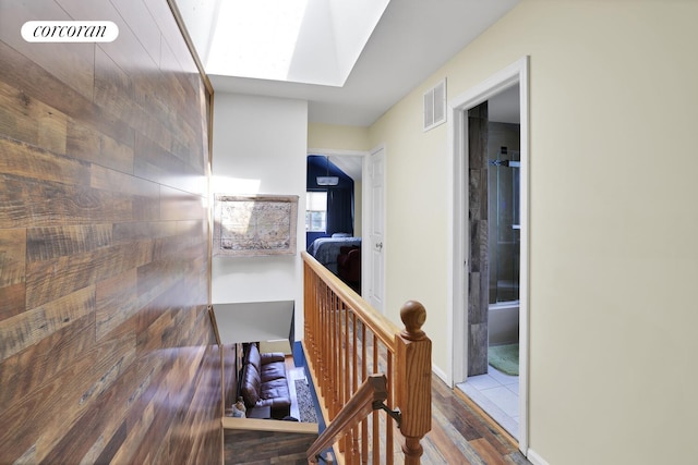 2054 Richmond Ave, New York City, NY 10314 - hall with a skylight and wood finished floors
