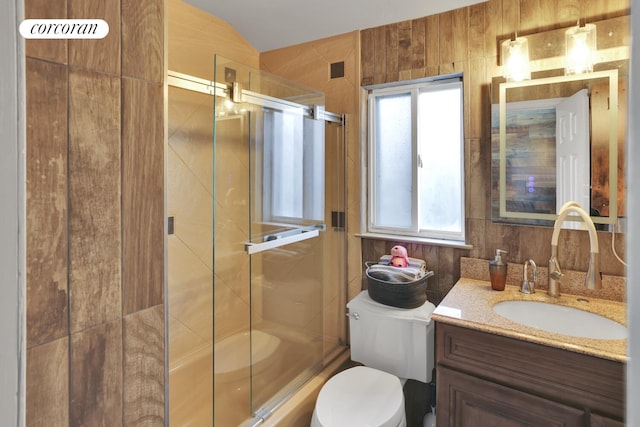 2054 Richmond Ave, New York City, NY 10314 - bathroom with vanity and bath / shower combo with glass door