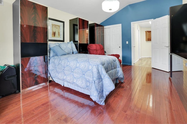 2054 Richmond Ave, New York City, NY 10314 - bedroom with vaulted ceiling, hardwood / wood-style flooring, and a closet