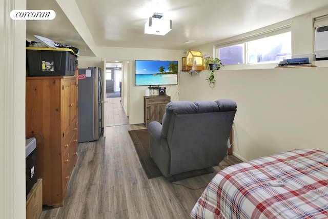 2054 Richmond Ave, New York City, NY 10314 - bedroom featuring freestanding refrigerator and wood finished floors