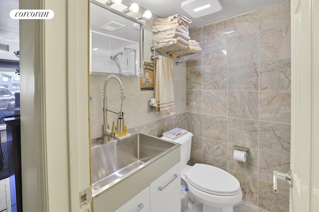 2054 Richmond Ave, New York City, NY 10314 - half bath with tile walls and vanity