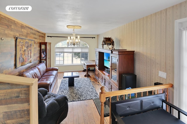 2054 Richmond Ave, New York City, NY 10314 - living area with wood-type flooring, a chandelier, and wallpapered walls
