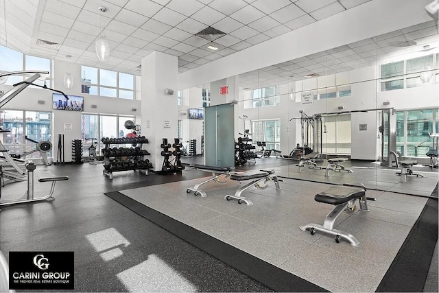 350 W 42nd St Unit 46E, New York City, NY 10036 - workout area featuring a high ceiling and a paneled ceiling