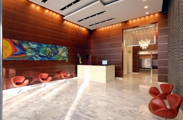 350 W 42nd St Unit 46E, New York City, NY 10036 - reception area featuring a chandelier