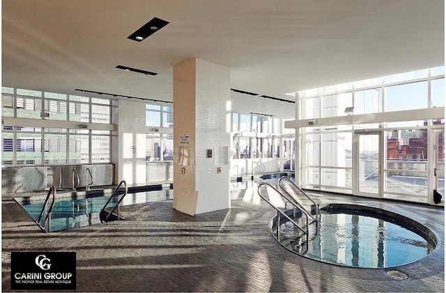 350 W 42nd St Unit 46E, New York City, NY 10036 - building lobby featuring a towering ceiling