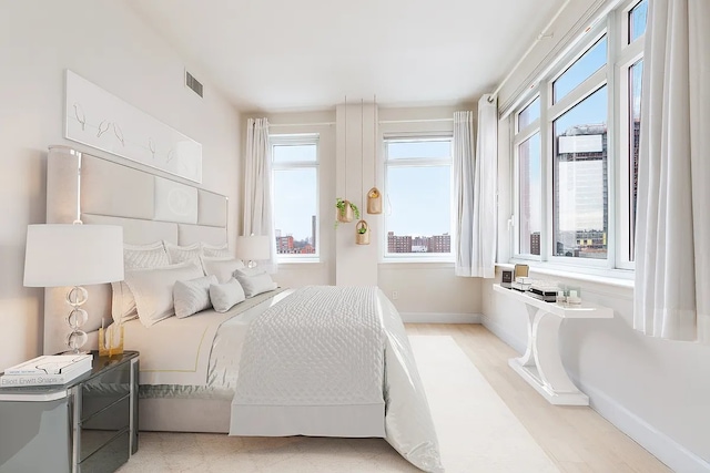 2300 Frederick Douglass Blvd Unit 11B, New York City, NY 10027 - bedroom featuring multiple windows
