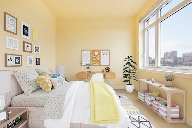 2300 Frederick Douglass Blvd Unit 11B, New York City, NY 10027 - bedroom with baseboards and wood finished floors