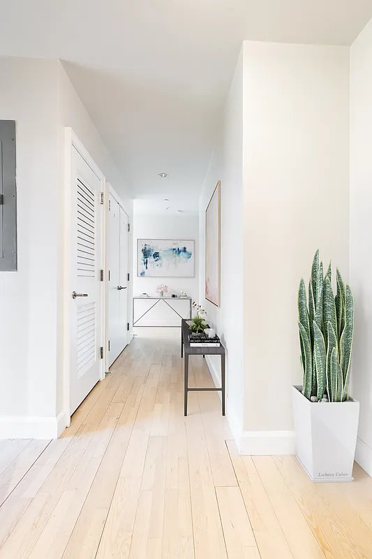 2300 Frederick Douglass Blvd Unit 11B, New York City, NY 10027 - hallway featuring light wood finished floors and electric panel