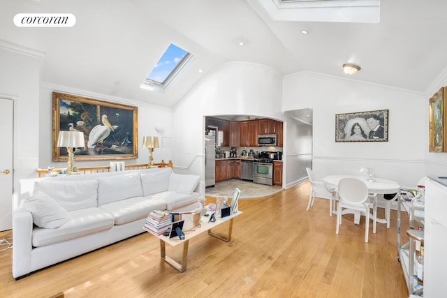 57 Bay 31st St Unit 3A, New York City, NY 11214 - living room with a skylight, lofted ceiling, light wood finished floors, and ornamental molding