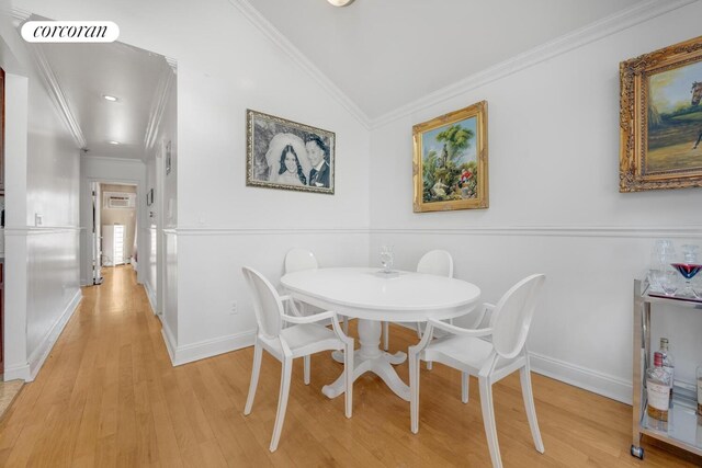 57 Bay 31st St Unit 3A, New York City, NY 11214 - dining area with lofted ceiling, light wood-type flooring, and crown molding