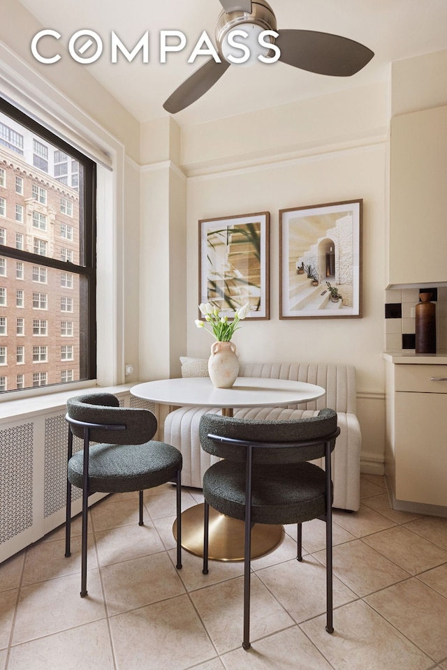 710 W End Ave Unit 9A, New York City, NY 10025 - dining area with breakfast area, radiator heating unit, and light tile patterned floors
