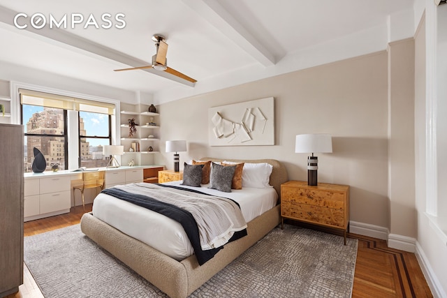 710 W End Ave Unit 9A, New York City, NY 10025 - bedroom featuring beam ceiling, light wood-type flooring, a ceiling fan, and built in study area