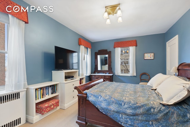 525 E 89th St Unit 4Hj, New York City, NY 10128 - carpeted bedroom with radiator