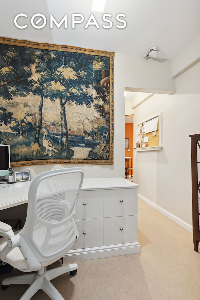 525 E 89th St Unit 4Hj, New York City, NY 10128 - office area featuring light colored carpet and baseboards