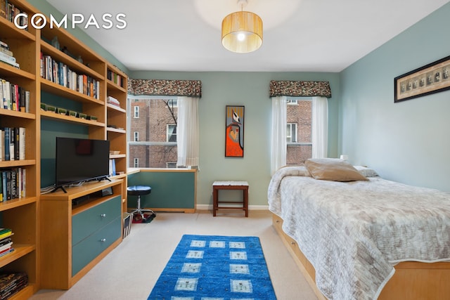 525 E 89th St Unit 4Hj, New York City, NY 10128 - carpeted bedroom featuring multiple windows
