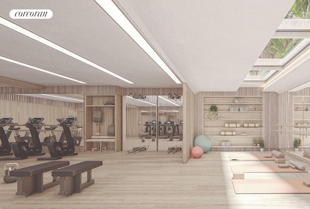 250 E 25th St Unit 9D, New York City, NY 10010 - gym with wood finished floors and wooden walls