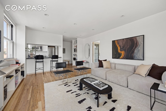 350 W 14th St Unit 6D, New York City, NY 10014 - living room featuring light wood-type flooring