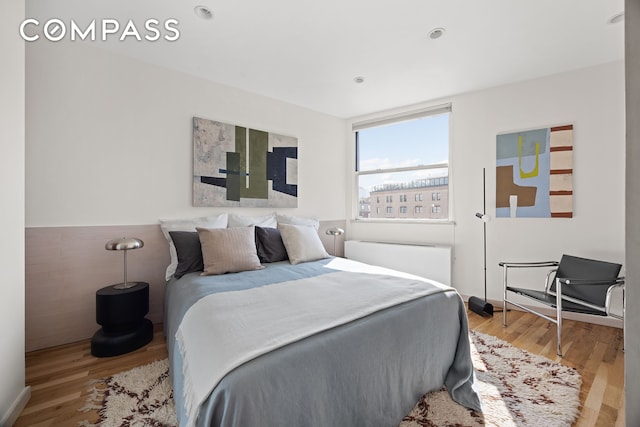 350 W 14th St Unit 6D, New York City, NY 10014 - bedroom featuring light wood finished floors
