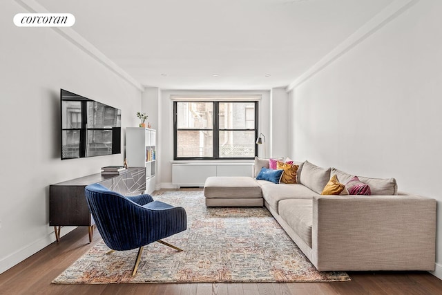 215 W 78th St Unit 2C, New York City, NY 10024 - living area featuring wood finished floors and baseboards