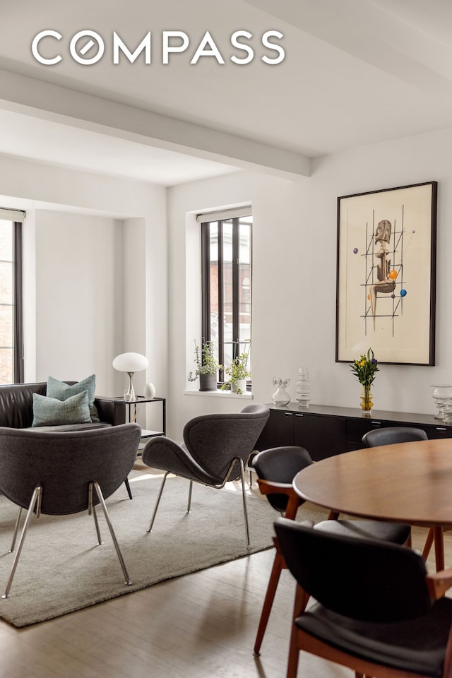 201 W 16th St Unit 9A, New York City, NY 10011 - dining space with wood finished floors and healthy amount of natural light
