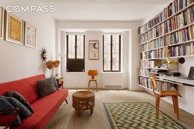 201 W 16th St Unit 9A, New York City, NY 10011 - sitting room with wood finished floors and baseboards