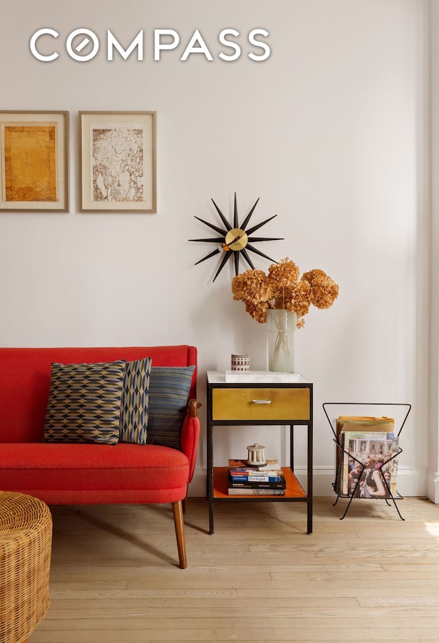 201 W 16th St Unit 9A, New York City, NY 10011 - sitting room with hardwood / wood-style flooring and baseboards