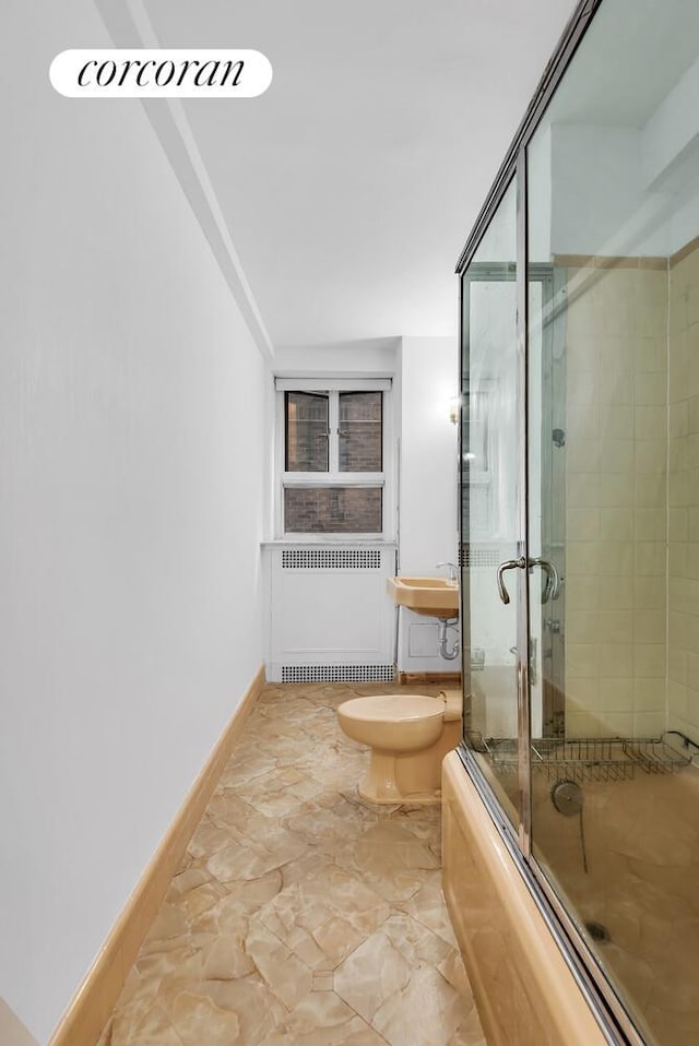 19 E 88th St Unit 4H, New York City, NY 10128 - full bathroom featuring bath / shower combo with glass door and radiator heating unit