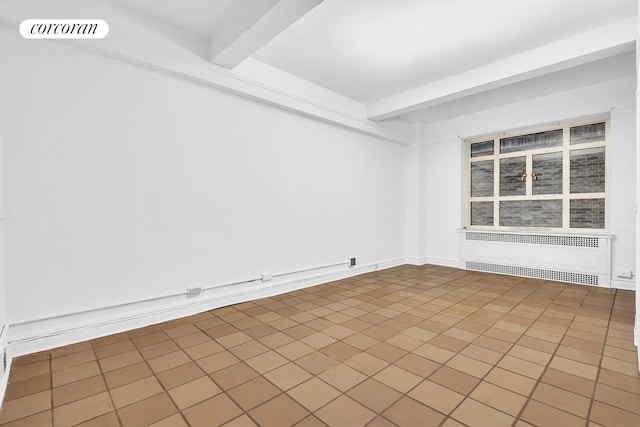 19 E 88th St Unit 4H, New York City, NY 10128 - unfurnished room featuring radiator heating unit and beam ceiling