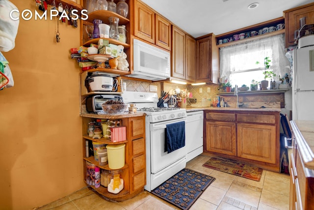 88-29 212th St, New York City, NY 11427 - kitchen with white appliances, open shelves, tasteful backsplash, and light tile patterned floors