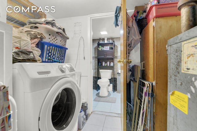 88-29 212th St, New York City, NY 11427 - laundry room featuring washer / clothes dryer and tile patterned floors
