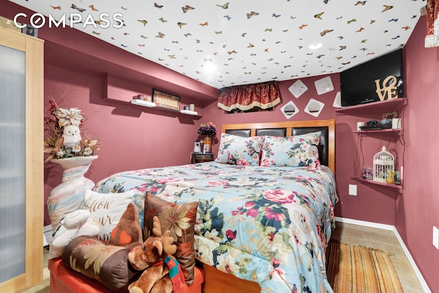 88-29 212th St, New York City, NY 11427 - tiled bedroom featuring baseboards