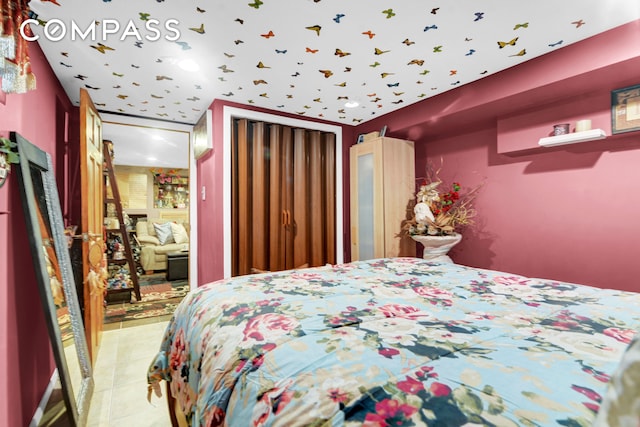 88-29 212th St, New York City, NY 11427 - bedroom with light tile patterned flooring