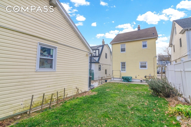 88-29 212th St, New York City, NY 11427 - rear view of house with a patio