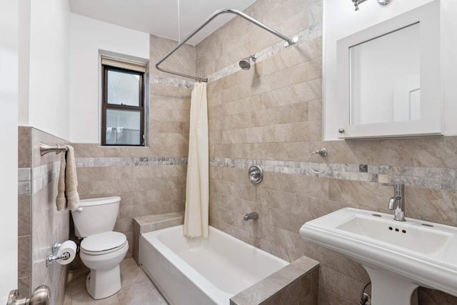350 Cabrini Blvd Unit 1A, New York City, NY 10040 - full bath featuring tile walls, shower / bath combo, and tile patterned floors