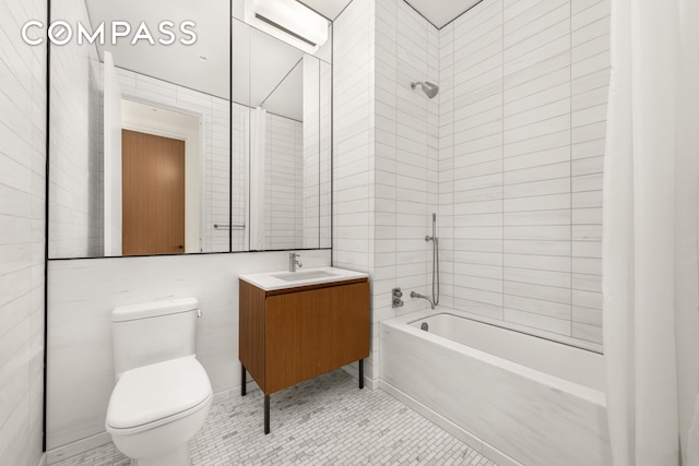 15 E 30th St Unit 30C, New York City, NY 10016 - full bathroom featuring  shower combination, vanity, tile patterned flooring, and tile walls