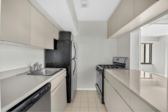 400 E 70th St Unit 1208, New York City, NY 10021 - kitchen featuring stainless steel appliances, light countertops, and light tile patterned flooring