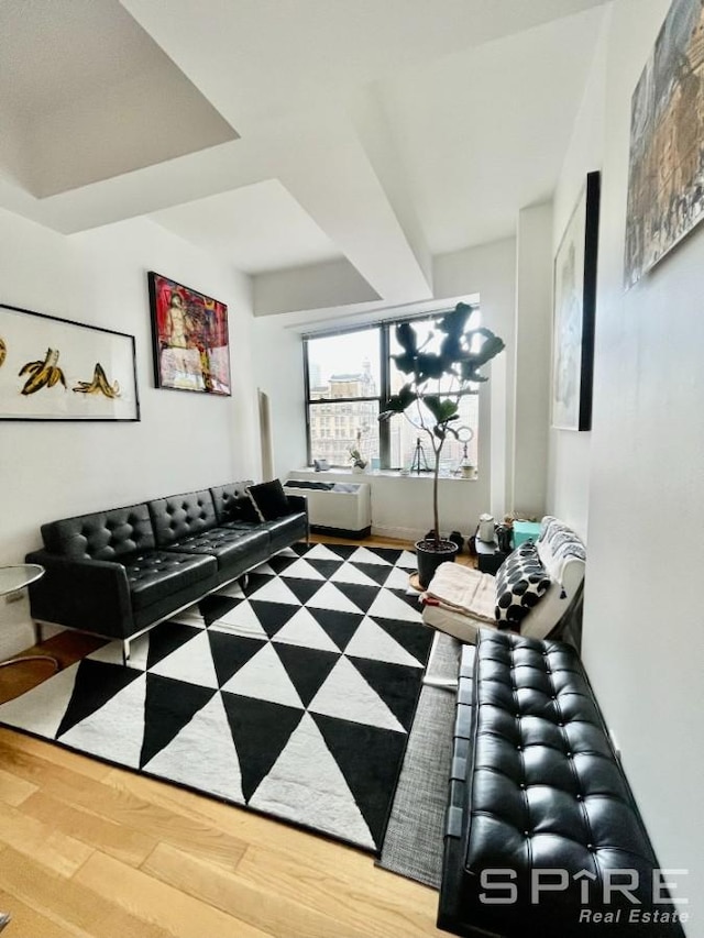 99 John St Unit 2201, New York City, NY 10038 - living room featuring wood finished floors