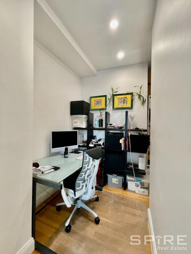 99 John St Unit 2201, New York City, NY 10038 - home office featuring wood finished floors and recessed lighting