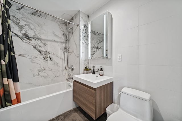 41-14 27th St Unit 8-B, New York City, NY 11101 - full bath featuring shower / bath combo with shower curtain, vanity, and tile walls
