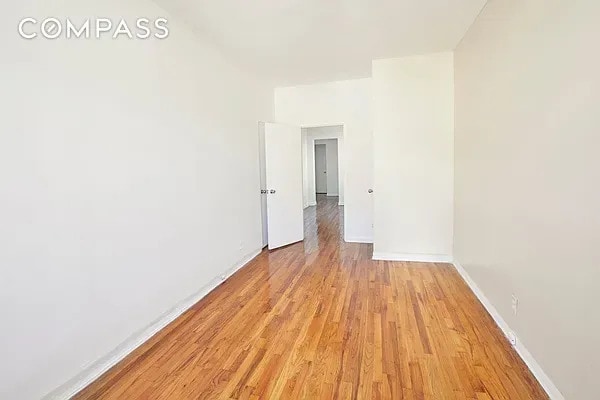 506 W 145th St Unit 4D, New York City, NY 10031 - unfurnished room featuring light wood finished floors