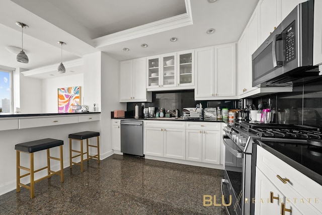 220 Riverside Blvd Unit 17-M, New York City, NY 10069 - kitchen with appliances with stainless steel finishes, recessed lighting, crown molding, dark countertops, and backsplash