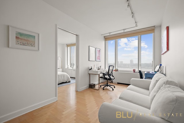 220 Riverside Blvd Unit 17-M, New York City, NY 10069 - living area with an office area, plenty of natural light, and rail lighting