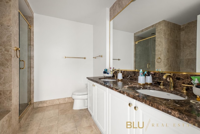 220 Riverside Blvd Unit 17-M, New York City, NY 10069 - bathroom featuring a shower stall, double vanity, and tile patterned flooring