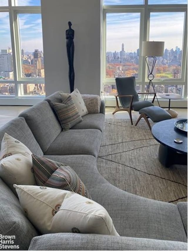 200 Amsterdam Ave Unit 32B, New York City, NY 10023 - living room with a view of skyline and plenty of natural light