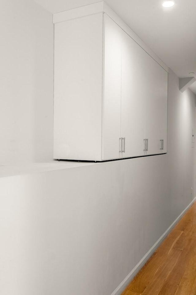20 W St Unit 18F, New York City, NY 10004 - detailed view of wood finished floors and recessed lighting