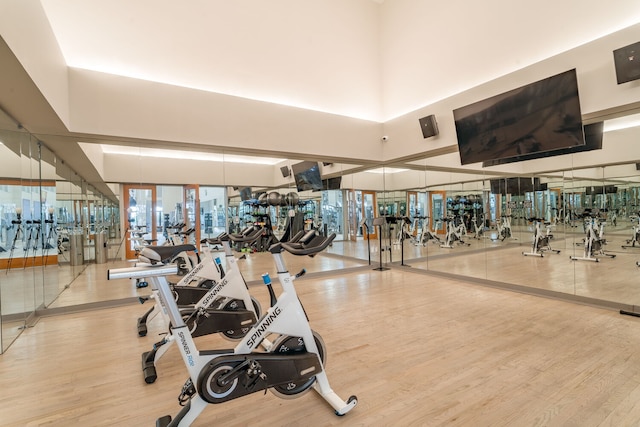 20 W St Unit 18F, New York City, NY 10004 - exercise room featuring wood finished floors