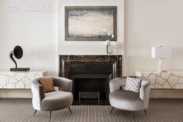4 E 82nd St Unit 3F, New York City, NY 10028 - sitting room with carpet floors and a fireplace with flush hearth