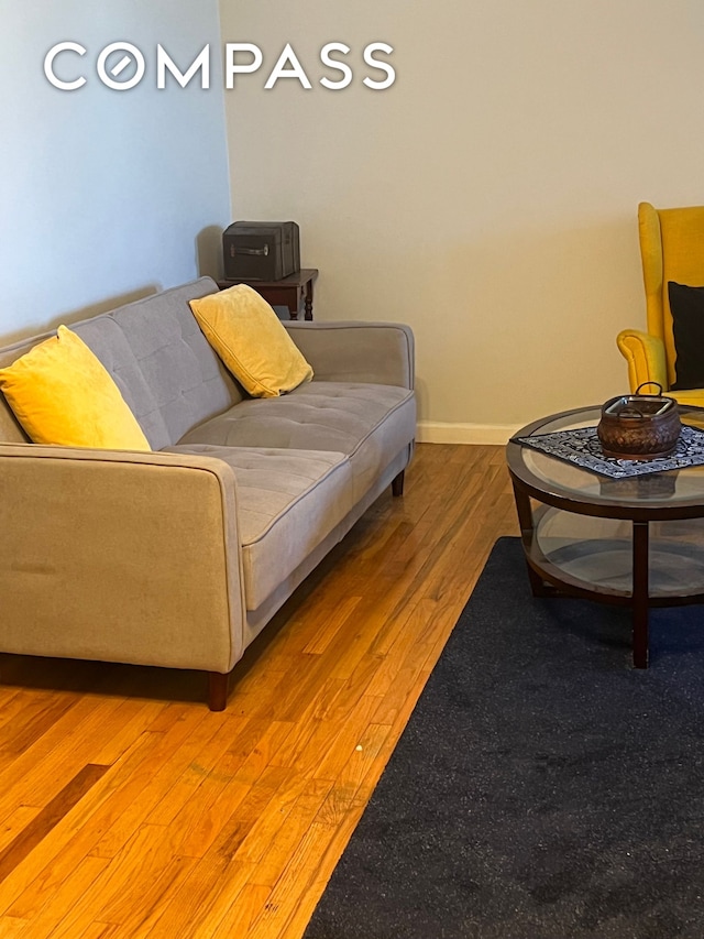 2035 E 7th St Unit 6B, New York City, NY 11223 - living area featuring light wood finished floors and baseboards