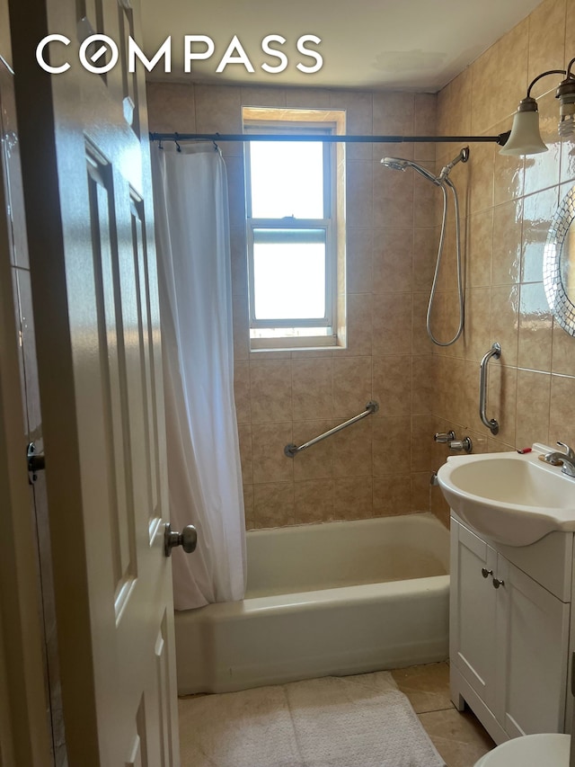 2035 E 7th St Unit 6B, New York City, NY 11223 - full bath featuring vanity, shower / bath combo, and tile patterned flooring