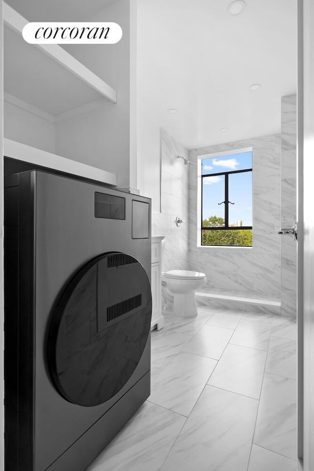 100 Riverside Dr Unit 7B, New York City, NY 10024 - full bath featuring a shower, washer / clothes dryer, and marble finish flooring